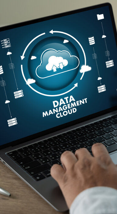 computer with folders containing check-marked documents and arrows indicating file transfer.