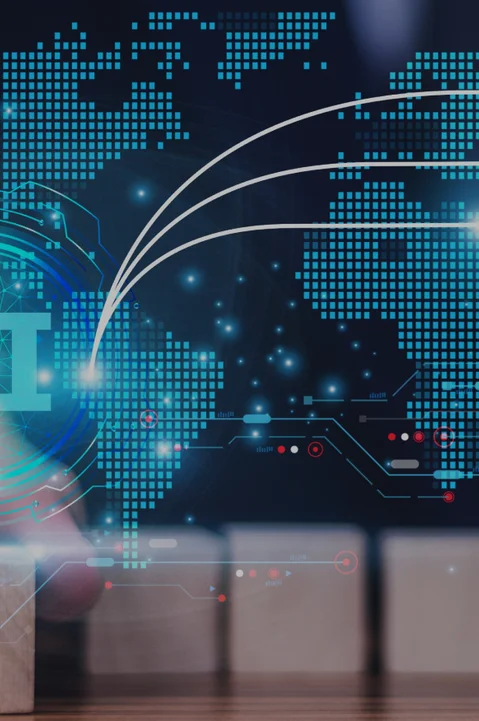 Close-up of a hand placing wooden blocks with a digital overlay of AI and a world map, symbolizing AI-powered global connections.