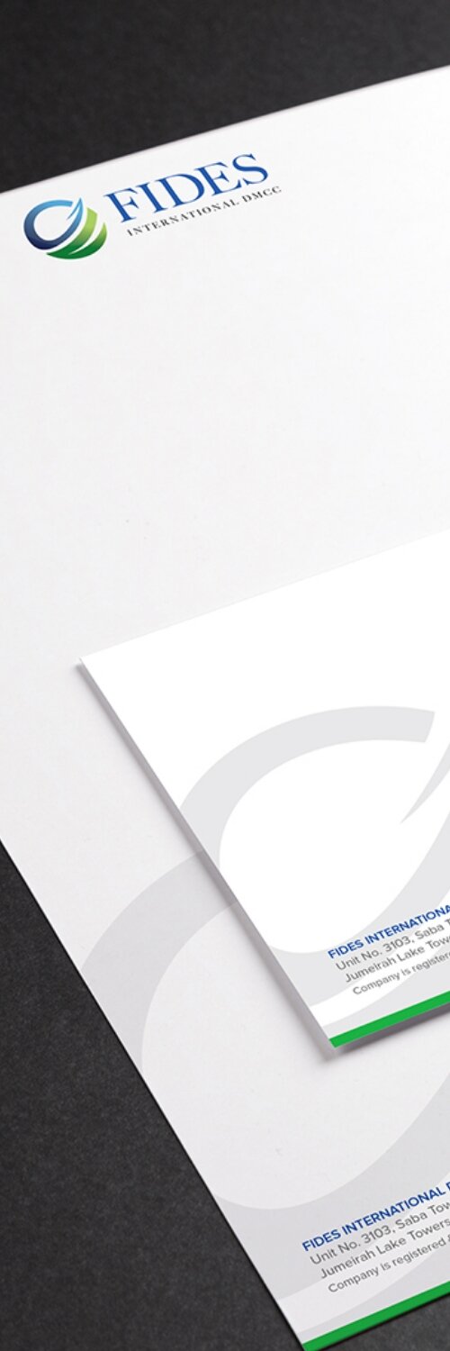 Hand writing in an open notebook under a lightbulb, symbolizing creative services by a creative services company for rebranding and brand refresh on the Rebranding & Brand Refresh page