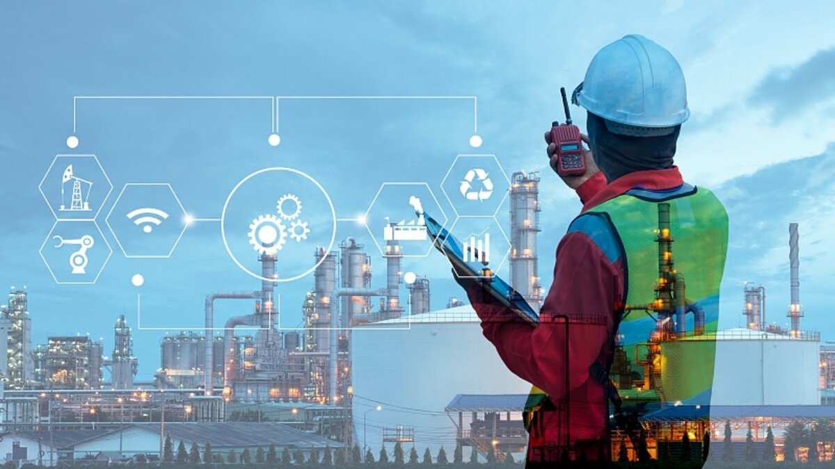 An illustration of cutting-edge industrial automation, featuring robots and smart machinery in a modern factory environment.