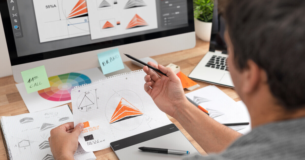 Image showing a designer working on digital illustrations,